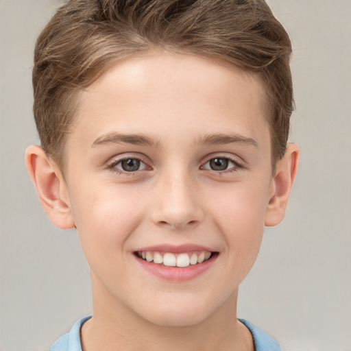 Joyful white child male with short  brown hair and grey eyes