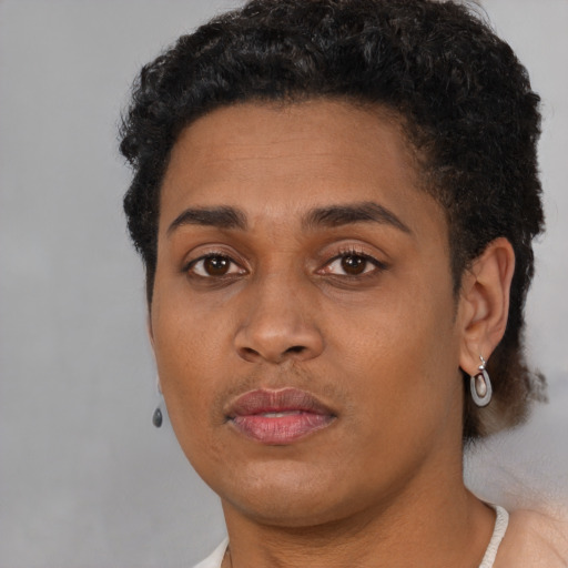 Neutral black young-adult female with short  black hair and brown eyes