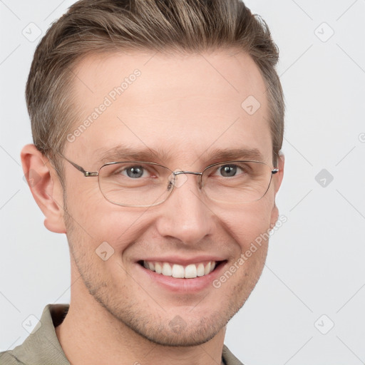 Joyful white adult male with short  brown hair and grey eyes