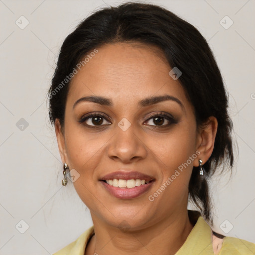 Joyful latino young-adult female with medium  brown hair and brown eyes