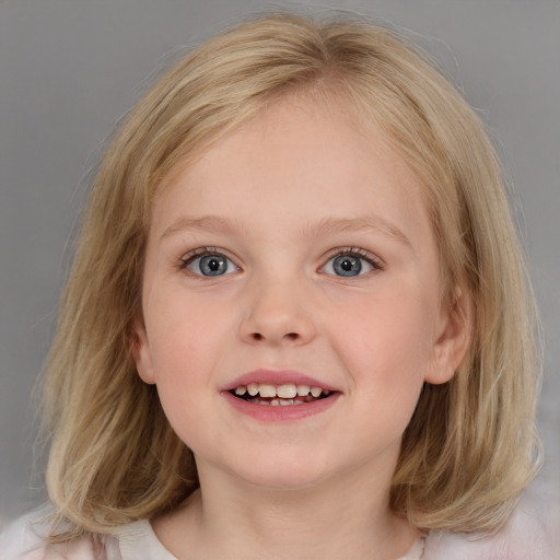 Joyful white child female with medium  brown hair and blue eyes