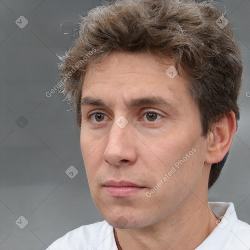 Neutral white adult male with short  brown hair and brown eyes