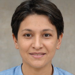 Joyful white adult female with short  brown hair and brown eyes