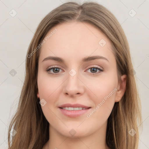 Joyful white young-adult female with long  brown hair and green eyes