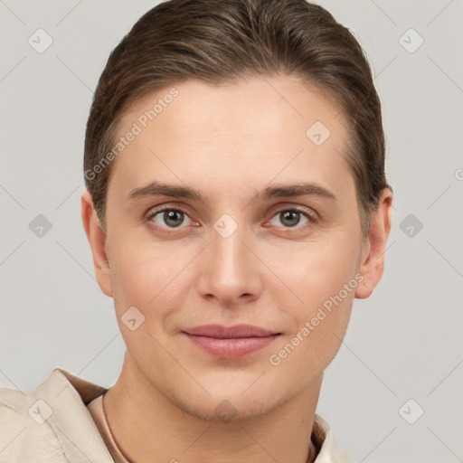 Joyful white young-adult female with short  brown hair and brown eyes