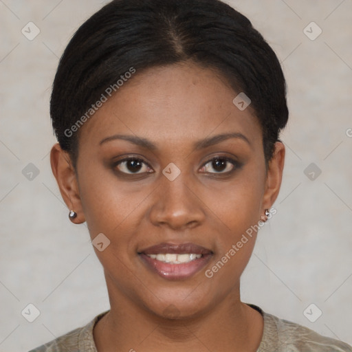 Joyful black young-adult female with short  brown hair and brown eyes