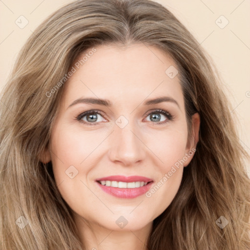 Joyful white young-adult female with long  brown hair and green eyes