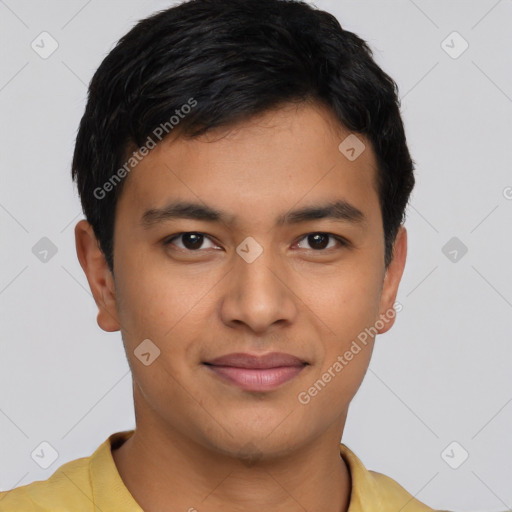 Joyful latino young-adult male with short  brown hair and brown eyes