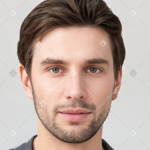 Neutral white young-adult male with short  brown hair and grey eyes