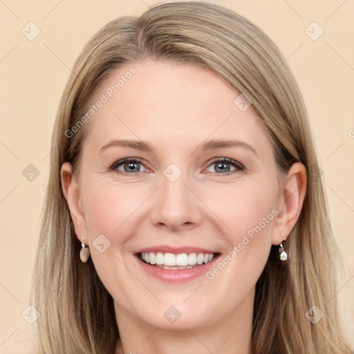 Joyful white young-adult female with long  brown hair and grey eyes