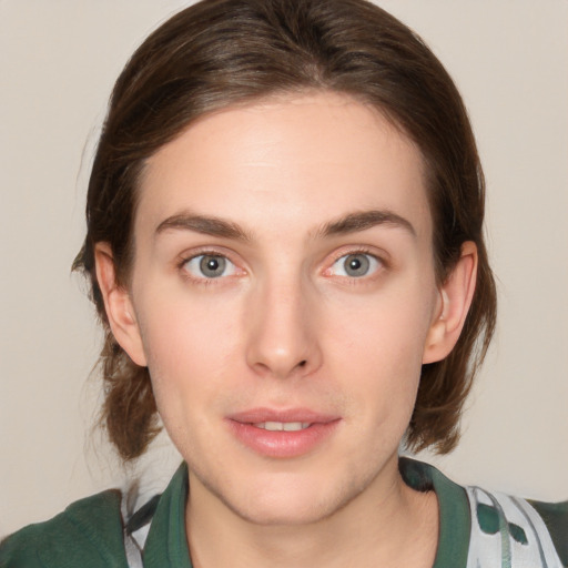 Neutral white young-adult female with medium  brown hair and green eyes