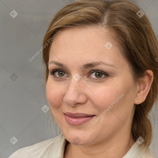 Joyful white adult female with medium  brown hair and brown eyes