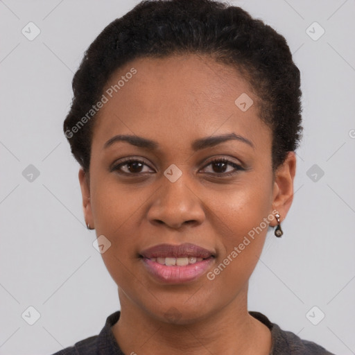 Joyful black young-adult female with short  black hair and brown eyes