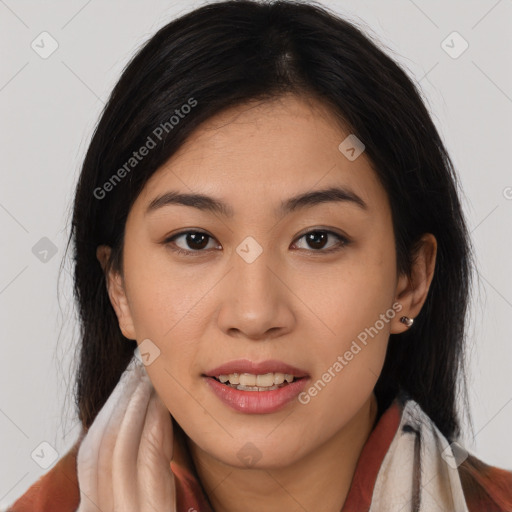 Joyful latino young-adult female with long  brown hair and brown eyes