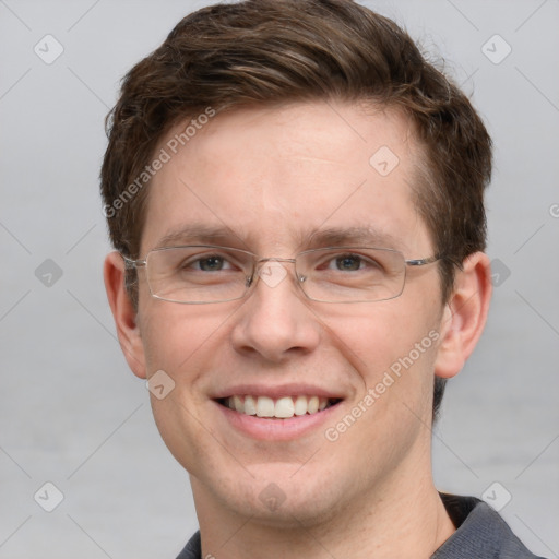 Joyful white adult male with short  brown hair and grey eyes