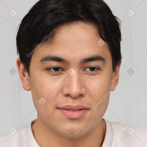 Joyful asian young-adult male with short  brown hair and brown eyes