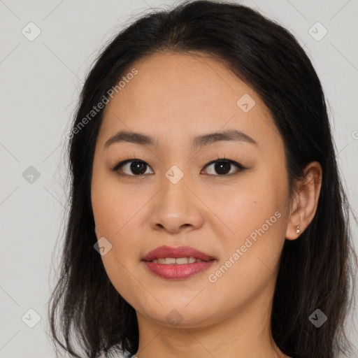 Joyful asian young-adult female with long  brown hair and brown eyes