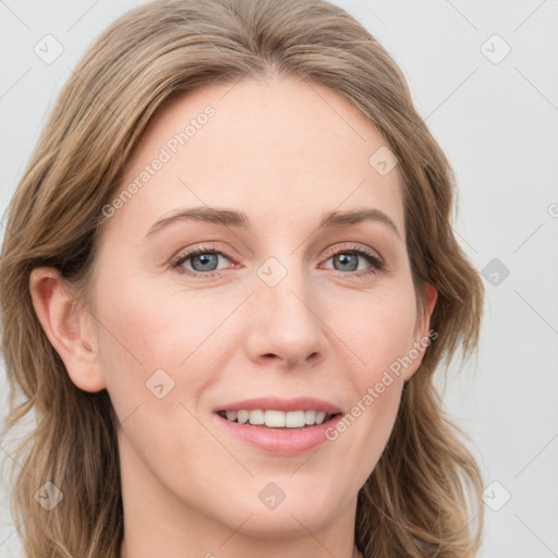 Joyful white young-adult female with medium  brown hair and blue eyes