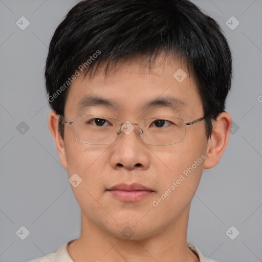 Neutral asian young-adult male with short  brown hair and brown eyes