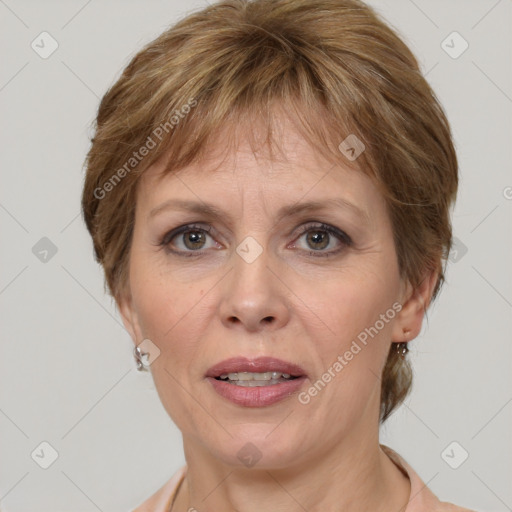 Joyful white adult female with medium  brown hair and grey eyes