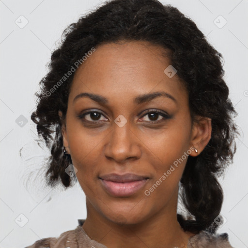 Joyful black young-adult female with medium  black hair and brown eyes