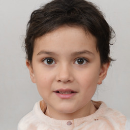 Joyful white child female with short  brown hair and brown eyes