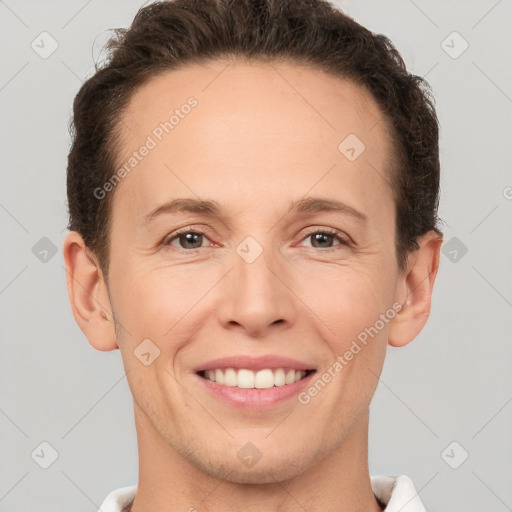 Joyful white adult female with short  brown hair and brown eyes