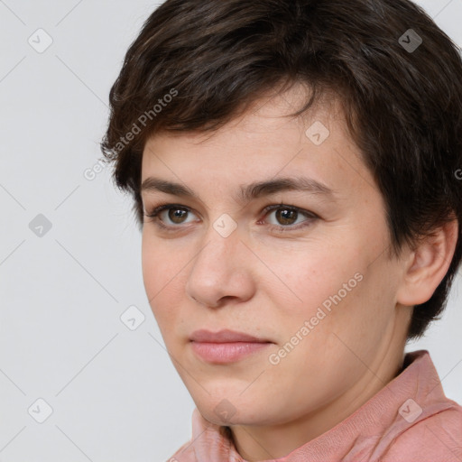 Joyful white young-adult female with short  brown hair and brown eyes