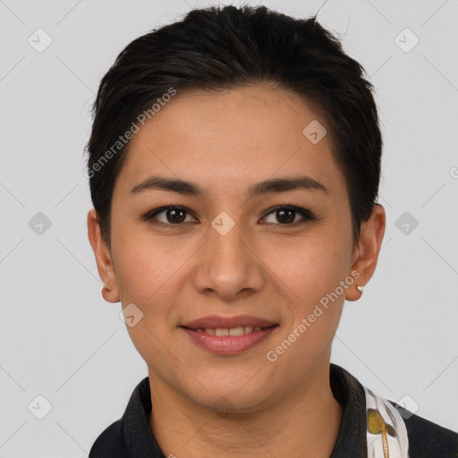 Joyful latino young-adult female with short  brown hair and brown eyes