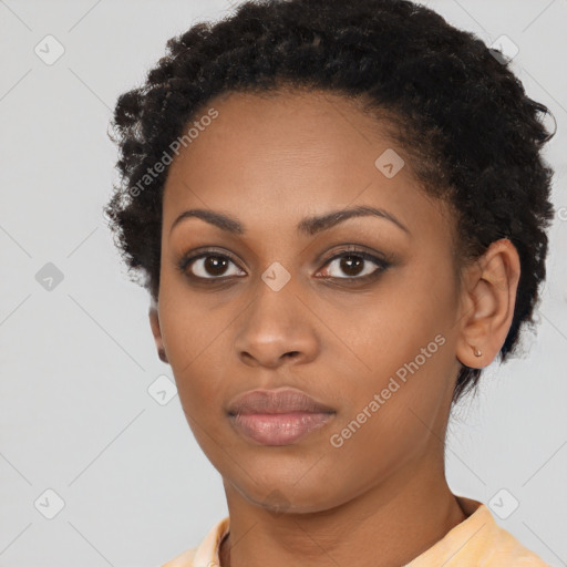 Neutral black young-adult female with short  brown hair and brown eyes