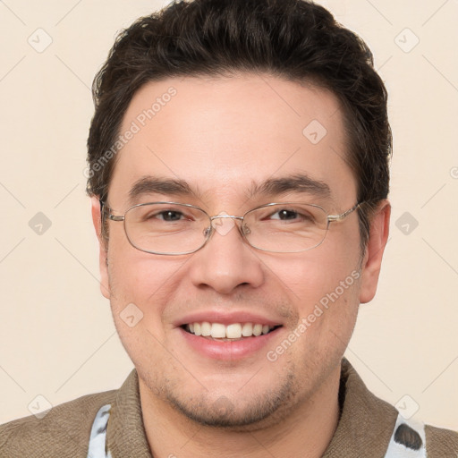 Joyful white adult male with short  brown hair and brown eyes