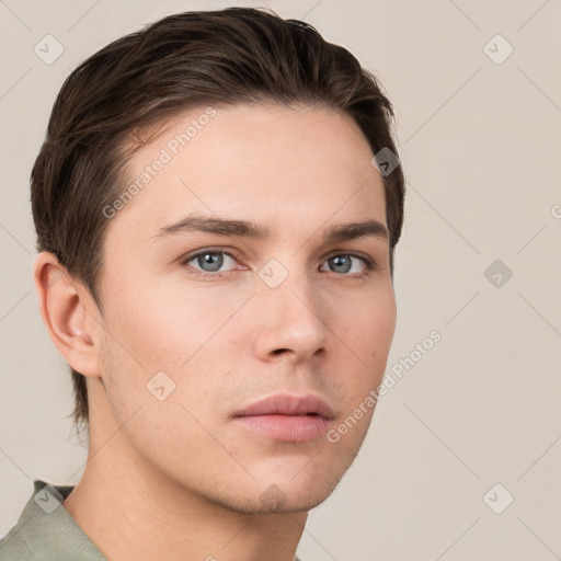 Neutral white young-adult male with short  brown hair and grey eyes