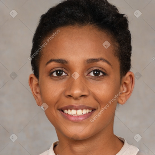 Joyful black young-adult female with short  brown hair and brown eyes