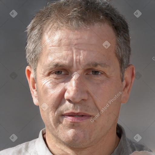 Neutral white middle-aged male with short  brown hair and brown eyes