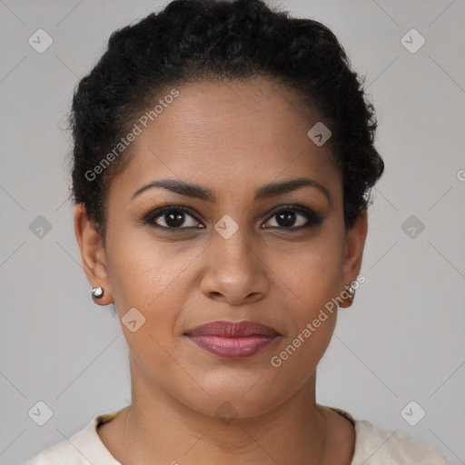 Joyful black young-adult female with short  black hair and brown eyes