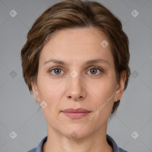 Joyful white adult female with medium  brown hair and grey eyes