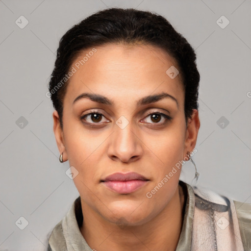 Joyful latino young-adult female with short  brown hair and brown eyes