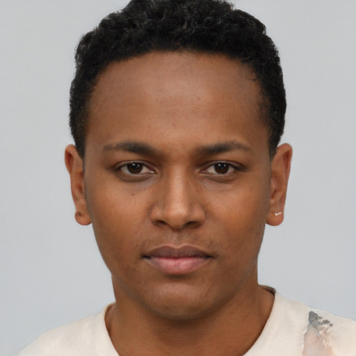 Neutral black young-adult male with short  black hair and brown eyes