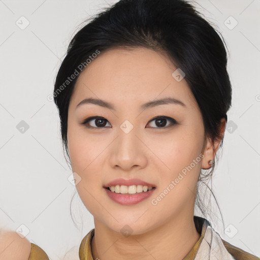 Joyful latino young-adult female with medium  black hair and brown eyes