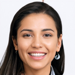 Joyful latino young-adult female with long  brown hair and brown eyes