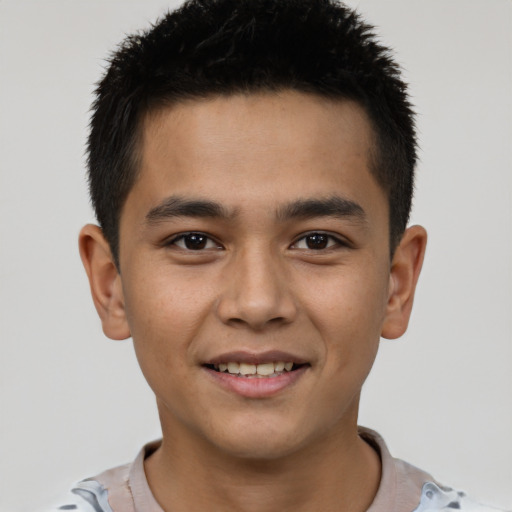 Joyful latino young-adult male with short  brown hair and brown eyes