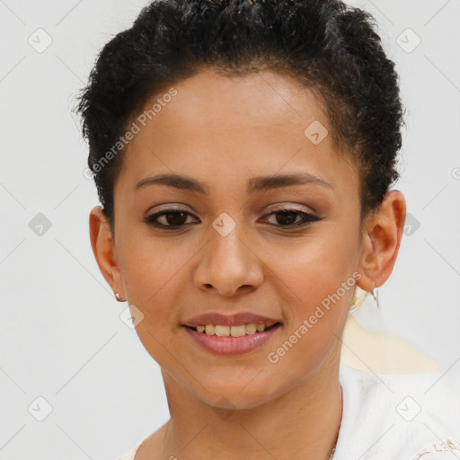 Joyful latino young-adult female with short  brown hair and brown eyes