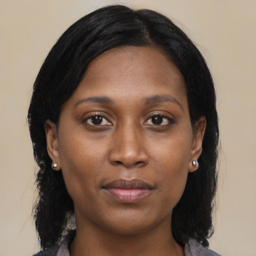 Neutral black young-adult female with medium  black hair and brown eyes