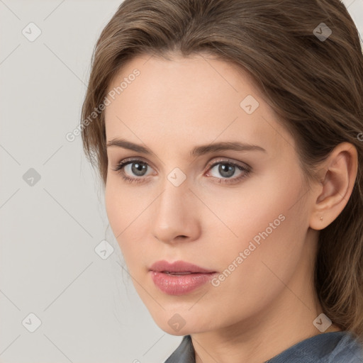 Neutral white young-adult female with medium  brown hair and grey eyes