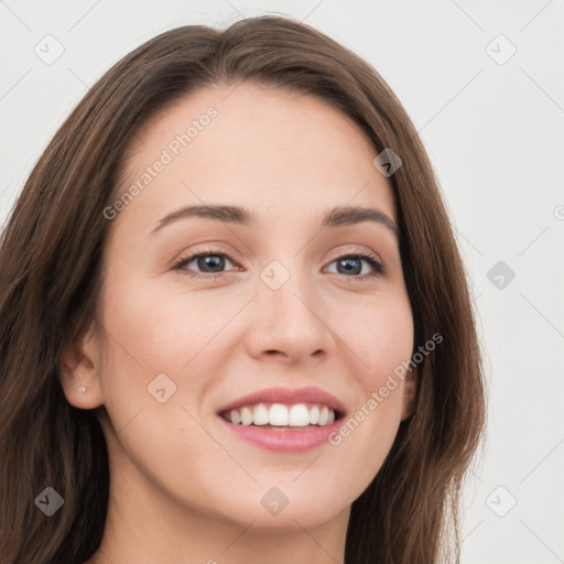 Joyful white young-adult female with long  brown hair and grey eyes