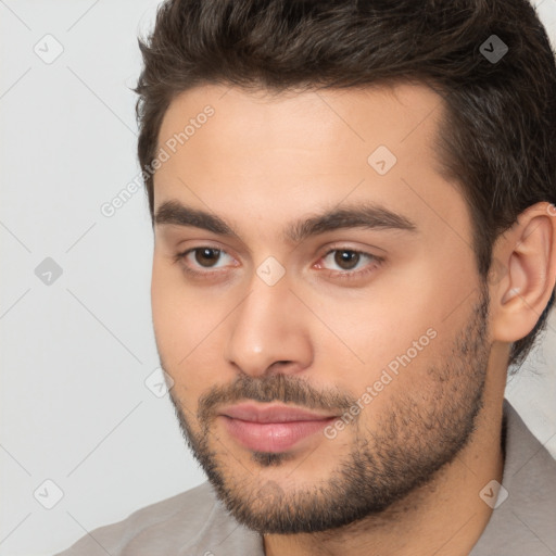 Neutral white young-adult male with short  brown hair and brown eyes