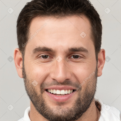 Joyful white young-adult male with short  brown hair and brown eyes