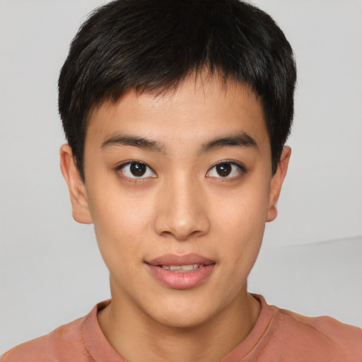 Joyful asian young-adult male with short  brown hair and brown eyes