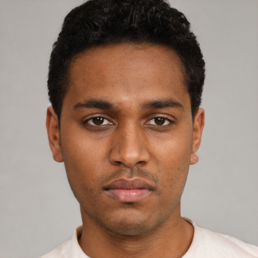 Neutral black young-adult male with short  black hair and brown eyes