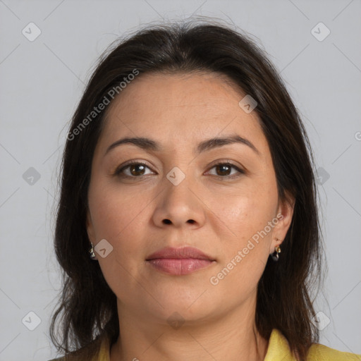 Joyful white adult female with medium  brown hair and brown eyes